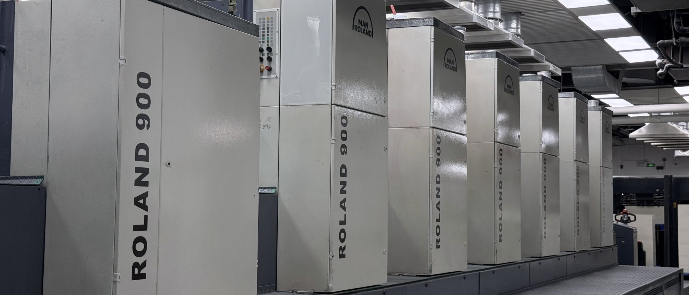 The pressroom: a row of manroland ROLAND 900 printing units