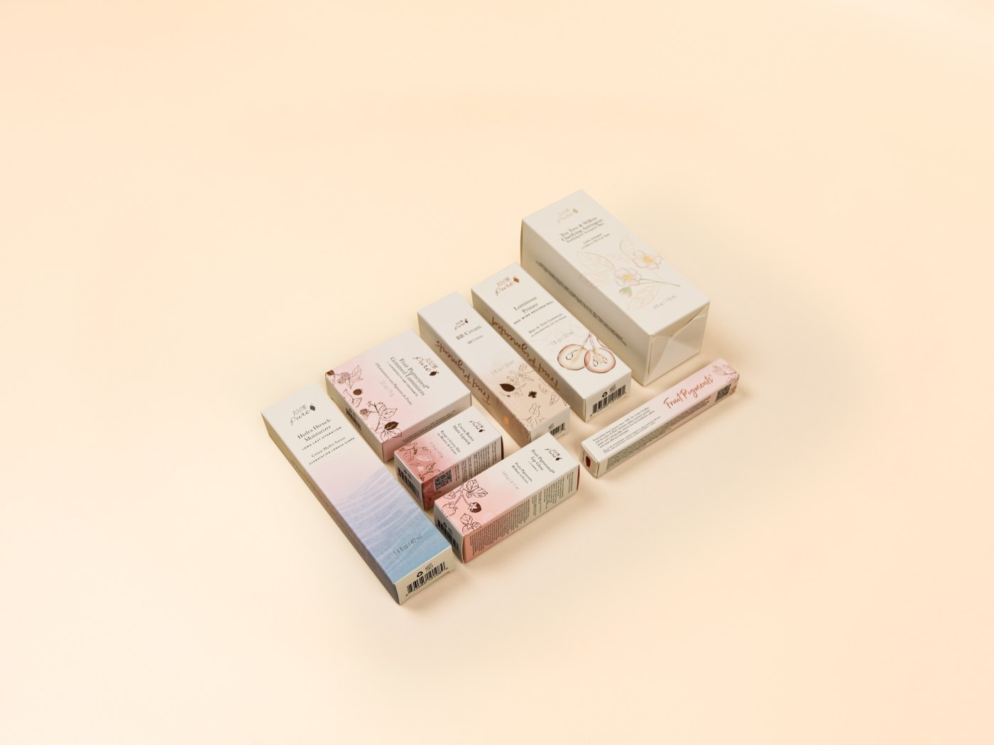 A matched range of folding cartons in soft colours